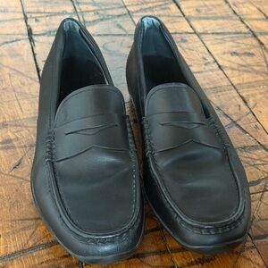Tod's Elegant Black Leather Slip-Ons
